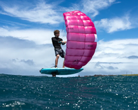 Green Hat Kiteboarding-Duotone Stash Parawing-Action Shot-Man Parawinging on Duotone Gear