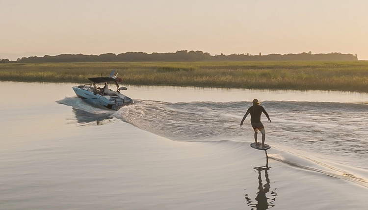 Green Hat Kiteboarding-Collection-Wake Foils-Man Wake Foiling behind a Boat on a Unifoil Progression Foil