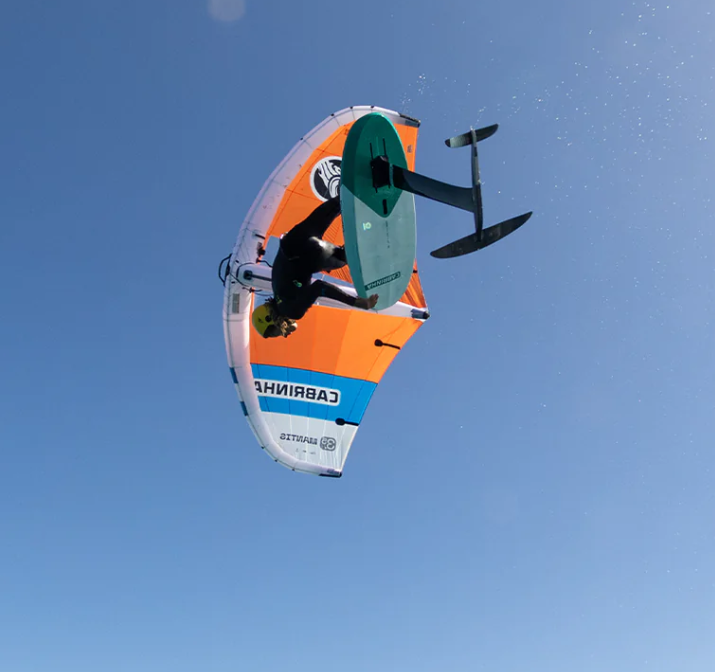 Load image into Gallery viewer, Green Hat Kiteboarding-2025 Cabrinha Mantis Wing-Action Shot-Man in the air on a Mantis Wing