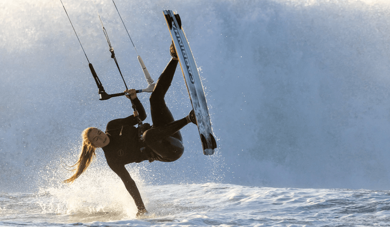 Load image into Gallery viewer, Green Hat Kiteboarding-2025 Cabrinha Vapor Kiteboard-Woman Doing a Hand Drag on the Cabrinha Vapor