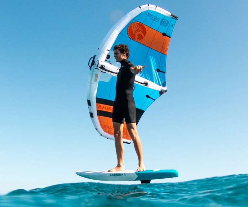 Load image into Gallery viewer, Green Hat Kiteboarding- 2025 Cabrinha Vision Wing-Action Shot-Man Winging with Cabrinha Wing and Board