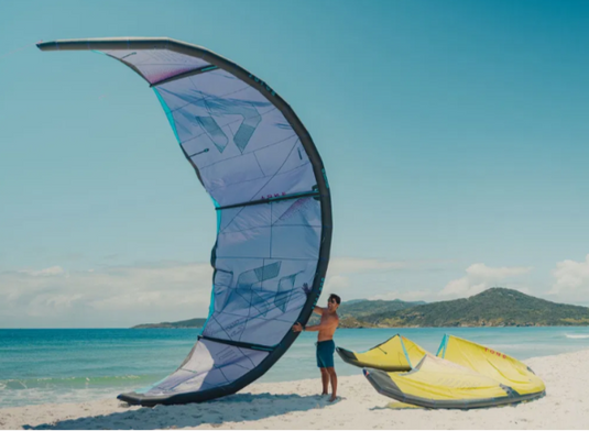 Green Hat Kiteboarding-2025 Duotone Juice-Live Shot- 2 Kite on a Beach in Paradise