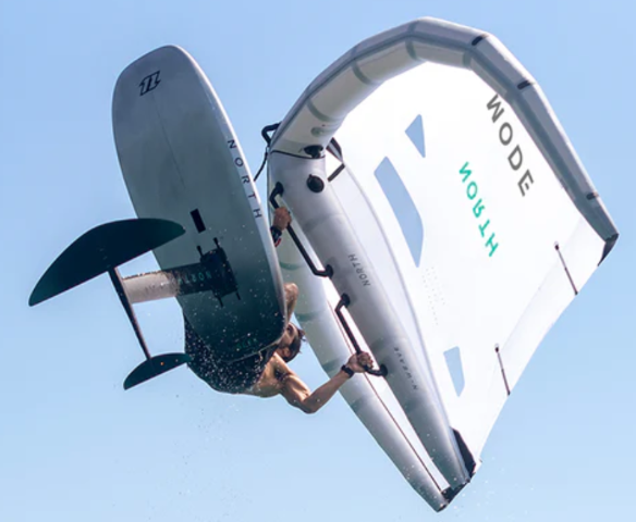 Load image into Gallery viewer, Green Hat Kiteboarding-North Sonar Carbon Fuselage-Action Shot-Man Jumping while Wing Foiling