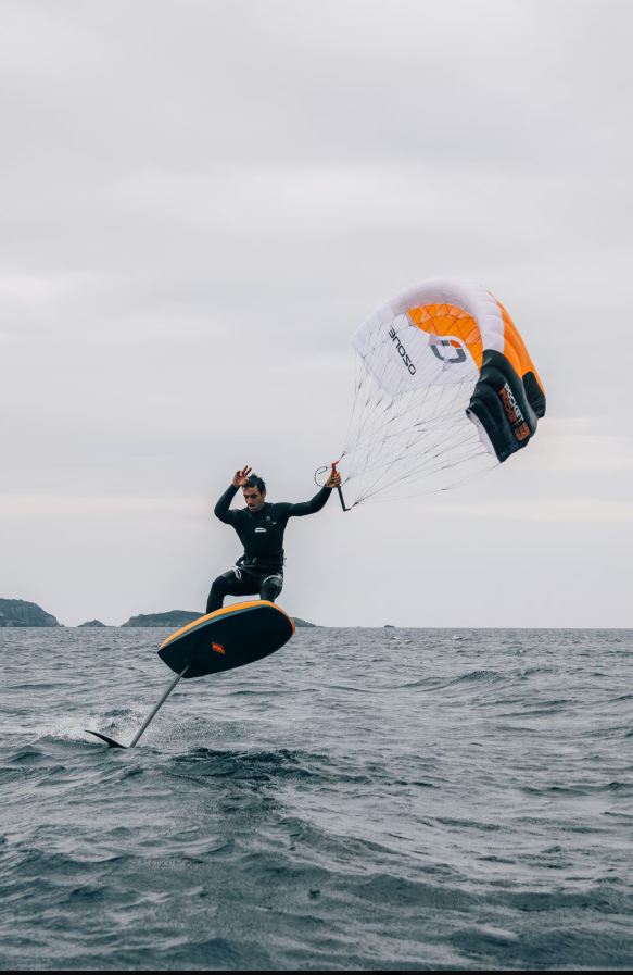 Load image into Gallery viewer, Green Hat Kiteboarding-2025 Ozone Pocket Rocket-Action Shot-Man Parawing Foiling on the Pocket Rocket 3m