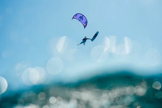 Load image into Gallery viewer, Green Hat Kiteboarding-2026 North Orbit Kite-Action Shot-Man Kite Looping the North Orbit