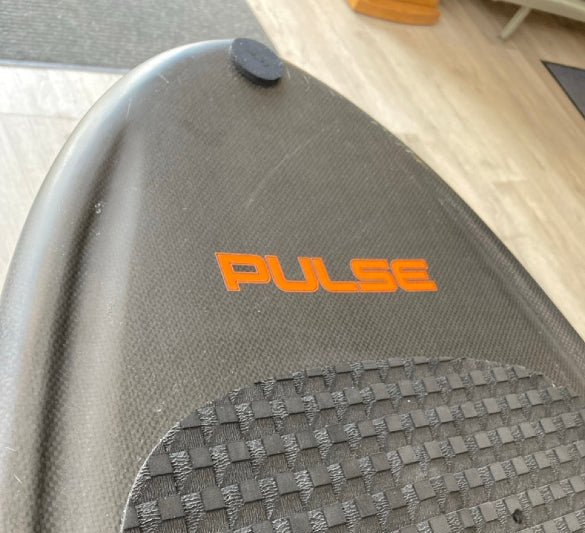 Load image into Gallery viewer, Green Hat Kiteboarding-4'6 Ozone Pulse V1 Carbon Foilboard USED-Nose View Close Up View on a Wooden Background