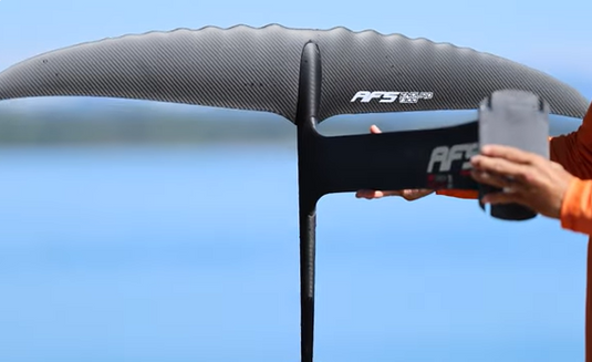 Green Hat Kiteboarding-AFS Enduro Full Carbon Foil-Live Shot-Man Holding a Full AFS Enduro Foil