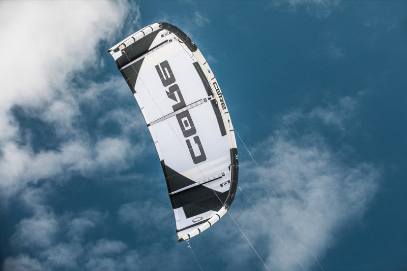 Load image into Gallery viewer, A Core XR7 7m Kiteboarding Kite soaring through the sky, perfect for windsports and air sports enthusiasts.
