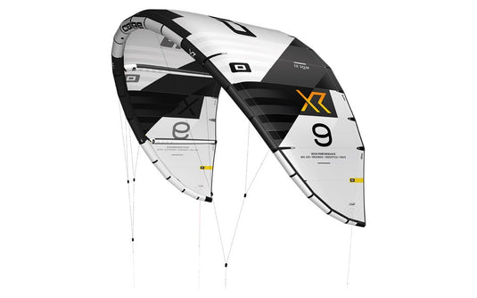 A used kiteboarding kite, the Core XR7 7m, soaring through the air with sketch-like lines, perfect for skiing and surfing.