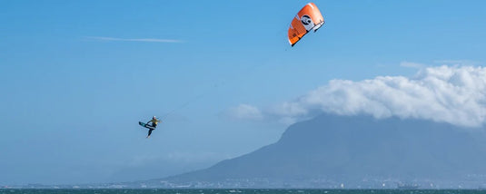 Green Hat Kiteboarding-2025 Cabrinha Nitro APEX Kite-Action Shot-Man Jumping on a Nitro APEX Kite Doing a Board Off.