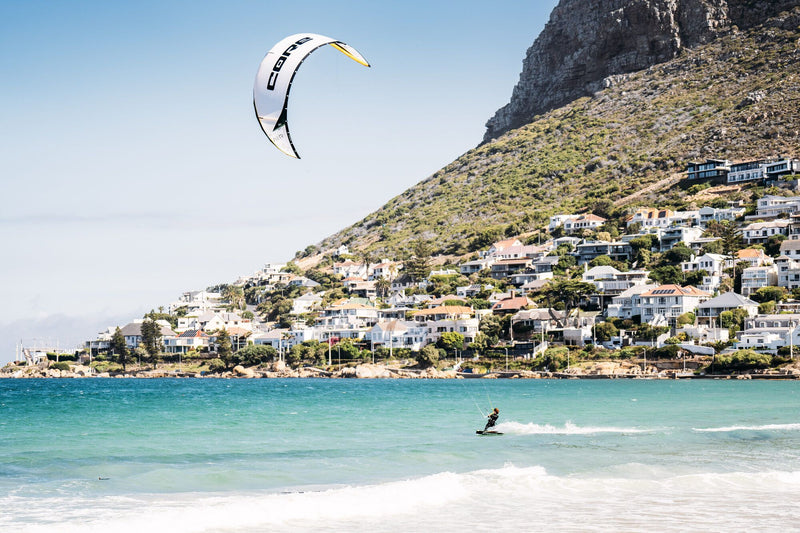 Load image into Gallery viewer, Green Hat Kiteboarding-Core Air Pro Kite-Action Shot-Man Riding the Core Air Pro