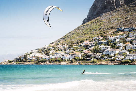 Green Hat Kiteboarding-Core Air Pro Kite-Action Shot-Man Riding the Core Air Pro