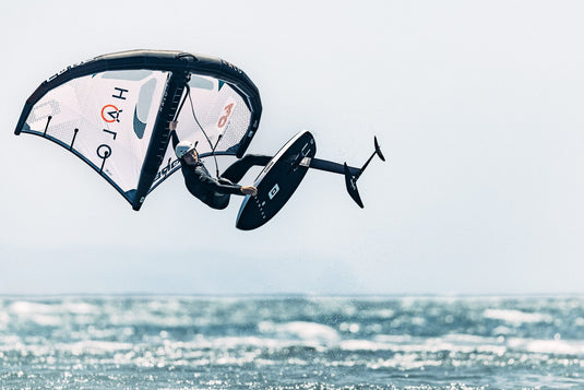 Green Hat Kiteboarding-Core Halo Wing-Action Shot-Man in the Air on a Core Halo Wing