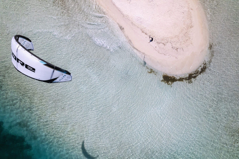 Load image into Gallery viewer, Green Hat Kiteboarding-Core AIR LW Kite-Live Shot-Core Air in the Air Above an Island