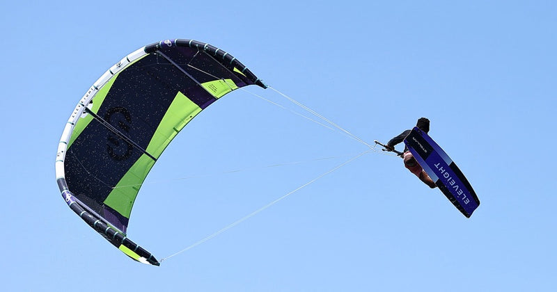 Load image into Gallery viewer, Green Hat Kitebording-2025 Eleveight XS V6 Kite-Action Shot-Man In the air on the Eleveight XS V6 Kite