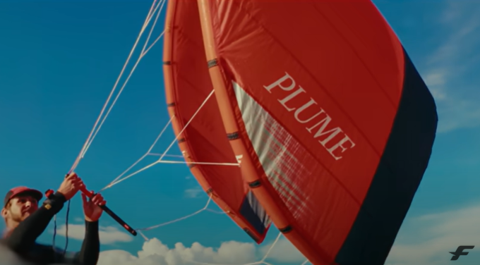 Load image into Gallery viewer, Green Hat Kiteboarding-F-One Plume-Live Shot-Close Up of Man Flying an F-One Plume