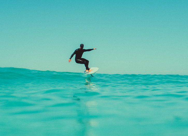 Load image into Gallery viewer, Green Hat Kiteboarding-F-One Phantom FCT Plane-Action Shot-Man Foil Surfing on an F-One Phantom