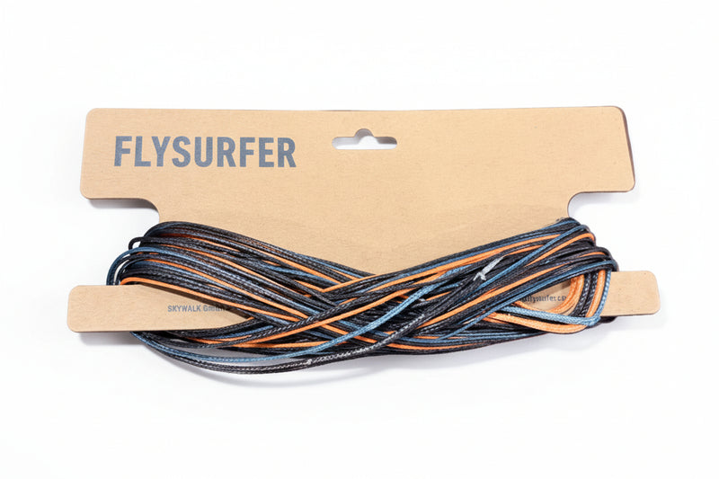 Load image into Gallery viewer, Flysurfer Lines coiled on a white surface