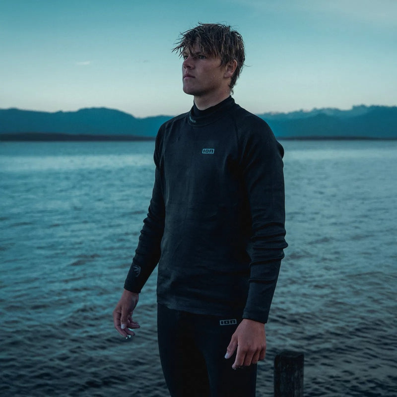 Load image into Gallery viewer, Man wearing Ion Long Sleeve Rash Guard on a white background