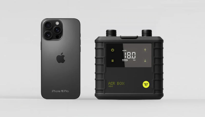 Load image into Gallery viewer, Green Hat Kiteboarding-Ride Engine Air Box Mini-Top View of Pump Next to an iPhone 16 on a White Background