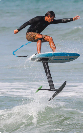 Load image into Gallery viewer, Green Hat Kiteboarding-Kaohi Board Leash-Double Coil 5.5mm-Action Shot-Man in the Air, Jumping off a Wave While Prone Foiling