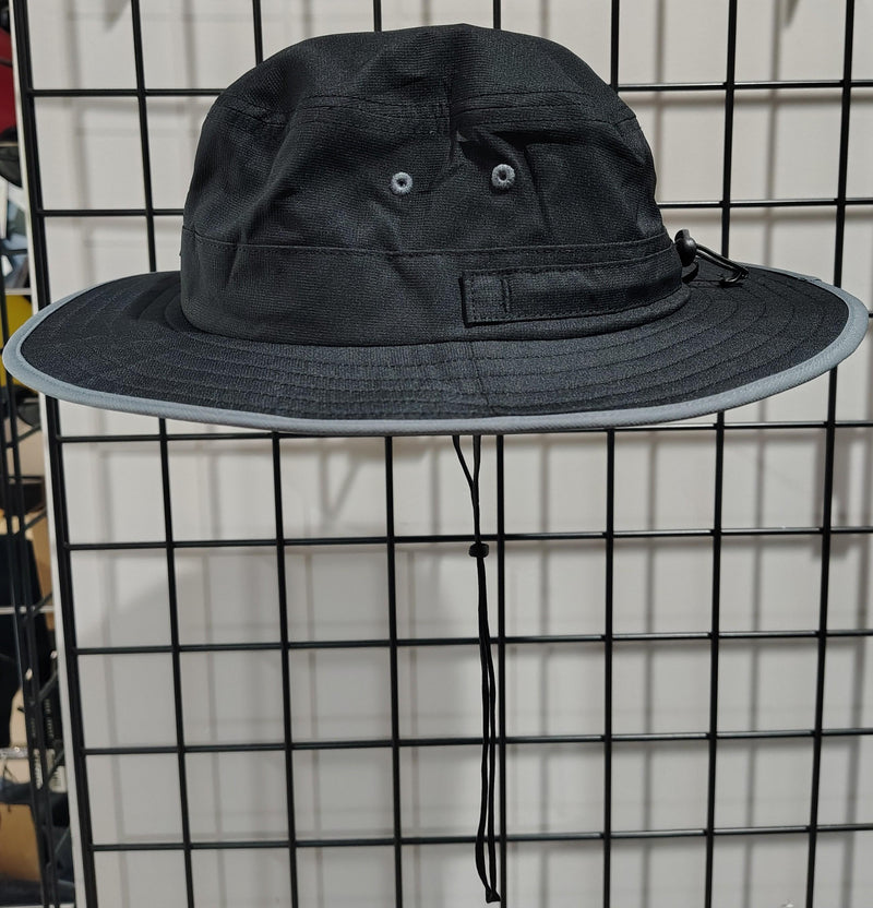 Load image into Gallery viewer, Green Hat Kiteboarding-Lift Foils Bucket Hat-Left View of Black bucket hat with a logo patch on a grid background