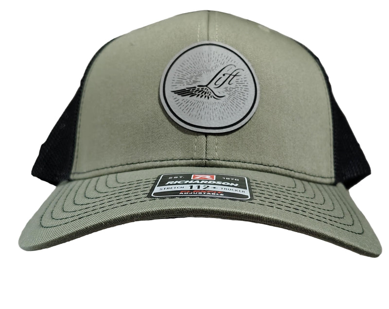 Load image into Gallery viewer, Green Hat Kiteboarding-Lift Foils Original Trucker Hat-Olive Green-Front View of cap on a grid background