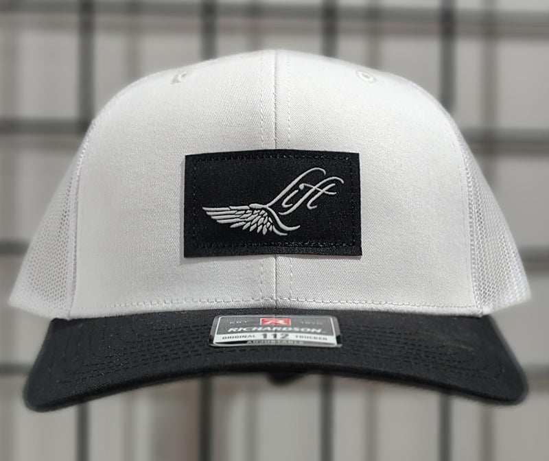 Load image into Gallery viewer, Green Hat Kiteboarding-Lift Foils Original Trucker Hat-White-Front View of cap on a grid background