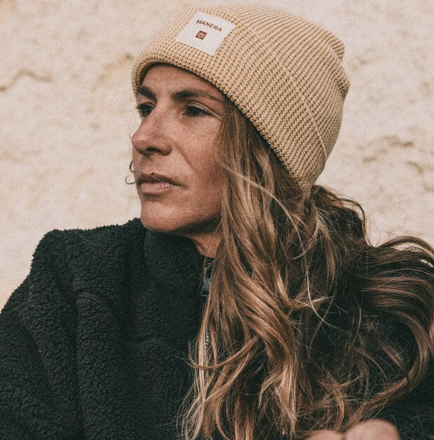 Load image into Gallery viewer, Green Hat Kiteboarding-Manera Beanie-Live Shot-Woman Wearing Almond Manera Beanie