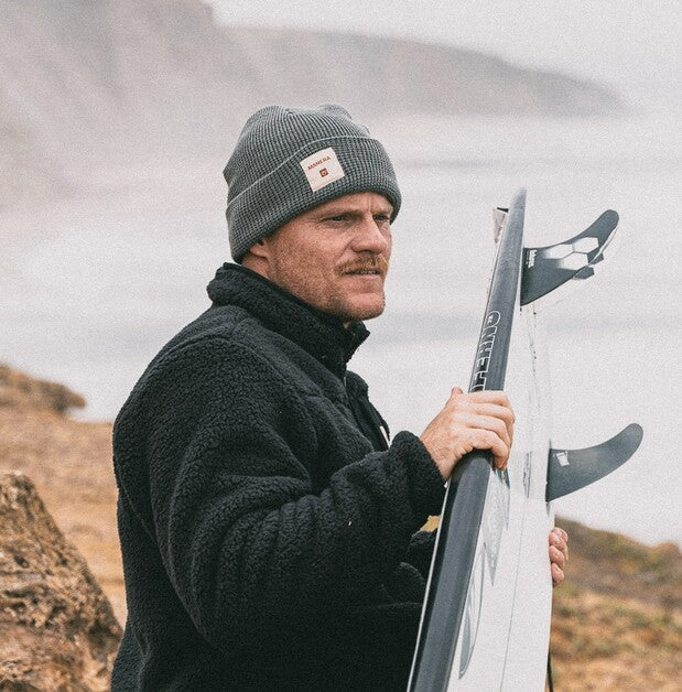 Load image into Gallery viewer, Green Hat Kiteboarding-Manera Beanie-Live Shot-Man Wearing Pewter Manera Beanie