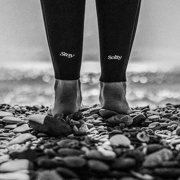 Load image into Gallery viewer, Green Hat Kiteboarding-Manera Seafarer 4/3 FZip Wetsuit-Live Shot-Close Up of a Womans Ankles Wearing the Manera Seafarer