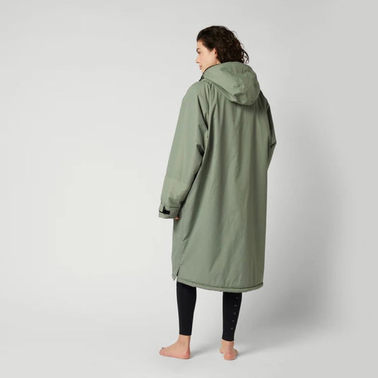 Green Hat Kiteboarding-Mystic Poncho Brave Green-Back View-Worn by Woman