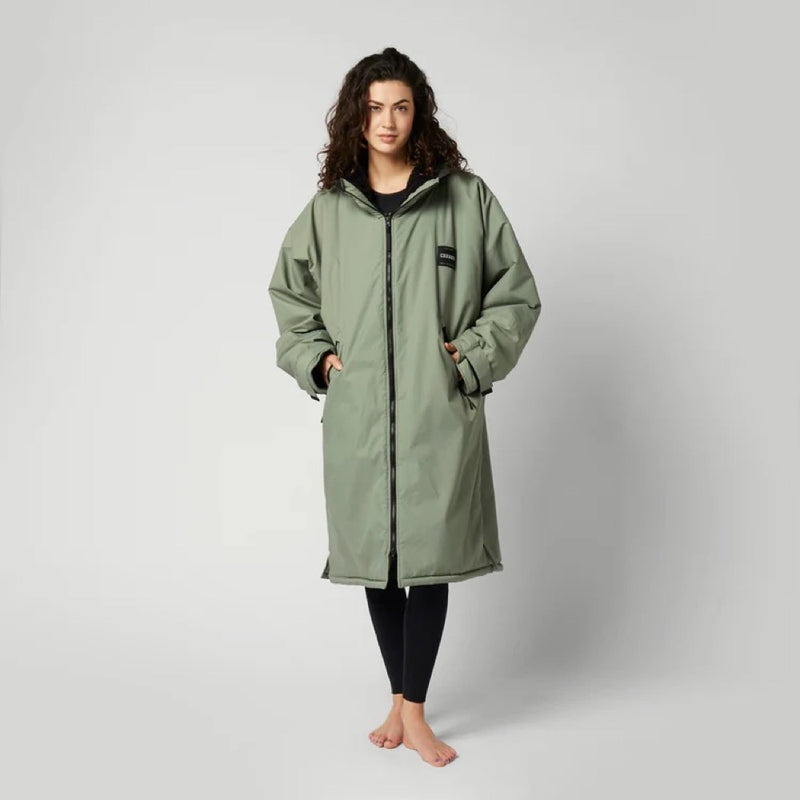 Load image into Gallery viewer, Green Hat Kiteboarding-Mystic Poncho Brave Green-Worn by Woman