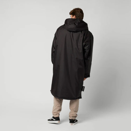 Green Hat Kiteboarding-Mystic Poncho Black-Back View-Worn by a Man