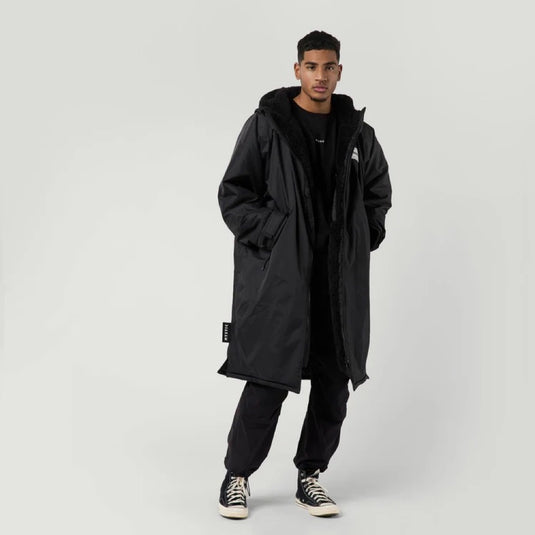 Green Hat Kiteboarding-Mystic Poncho Black-Worn by Man