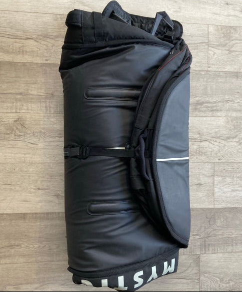 Load image into Gallery viewer, Green Hat Kiteboarding-Mystic 5'1 Saga Foil Board Bag USED-Rolled Up  View of the Bag on a Wooden Background
