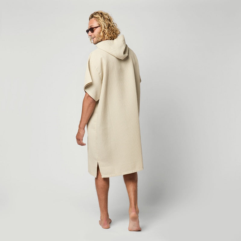 Load image into Gallery viewer, Person wearing a beige hooded garment against a plain background