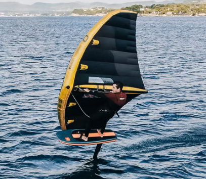 Load image into Gallery viewer, Green Hat Kiteboarding-Ozone Fusion V2 Ultra-X Wing-Action Shot-Man Wing Foiling on Black Fusion V2 Wing