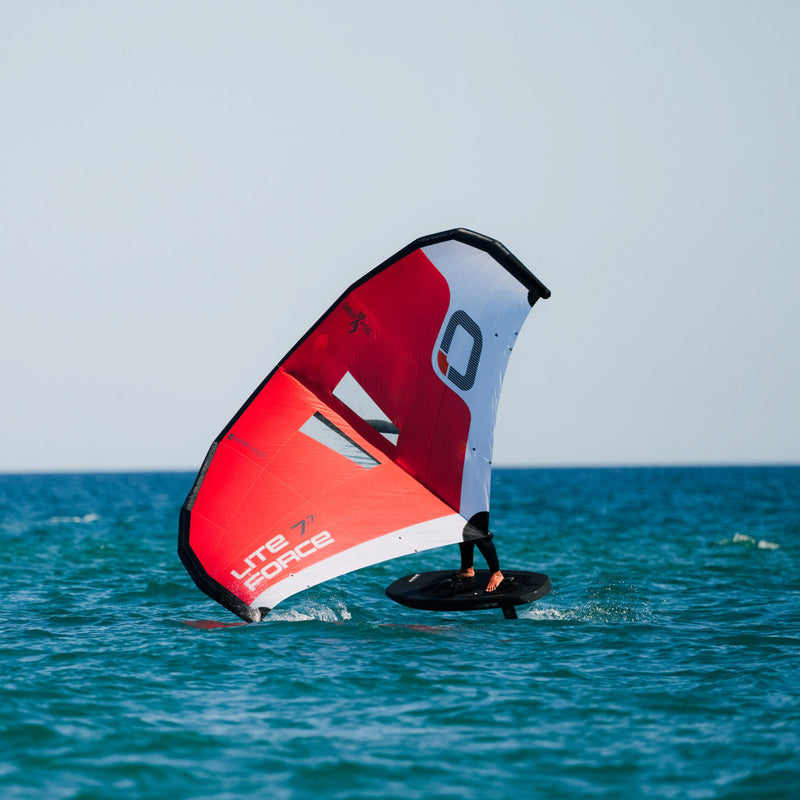 Load image into Gallery viewer, Green Hat Kiteboarding-Ozone Liteforce Wing Red-Action Shot-Man Winging on Ozone Liteforce