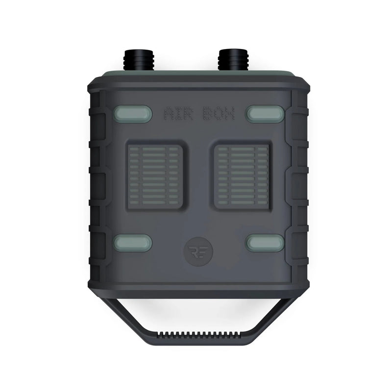 Load image into Gallery viewer, A black square object with two buttons, two vents, and a grey rectangular object with white lines - Ride Engine Air Box Electric Pump.
