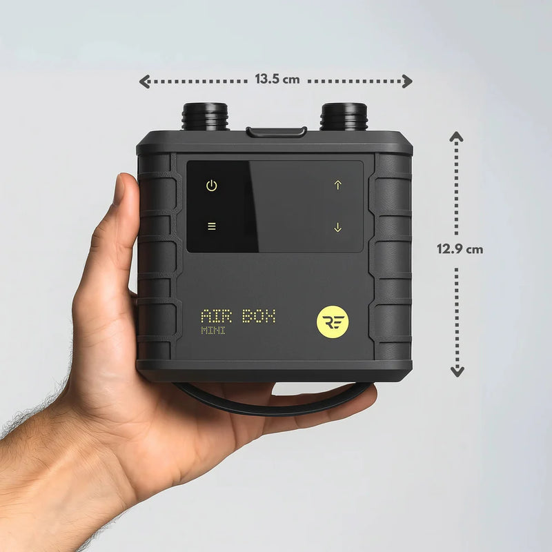 Load image into Gallery viewer, Green Hat Kiteboarding-Ride Engine Air Box Mini-Top View of Pump in a Mans Hand on a White Background