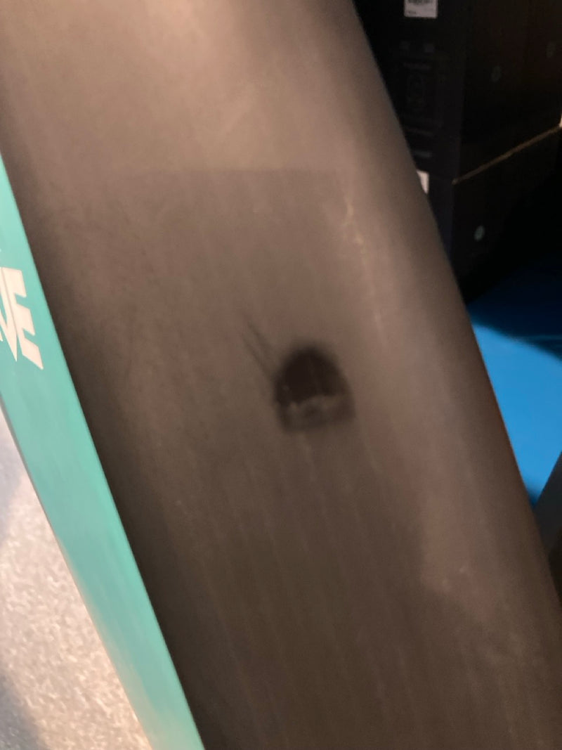 Load image into Gallery viewer, Green Hat Kiteboarding-Sunova X 4'8 Foil Drive Foilboard USED-Close Up View of Blemish on Edge of the Board