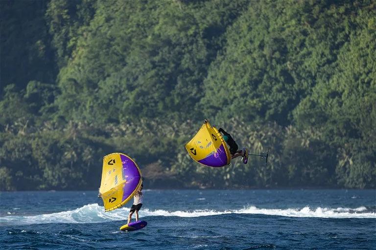 Load image into Gallery viewer, 2024 Duotone Unit D/LAB Foil Wings-2 wingers riding on a lake-One is in the air