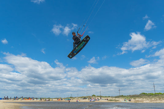 Green Hat Kiteboarding-John Harris Team Rider in the air at Sandy Hook on his Duotone Dice