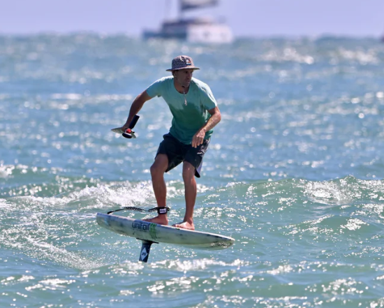 Load image into Gallery viewer, Green Hat Kiteboarding-Unifoil Evolution FW-Action Shot-Man Downwind Foiling
