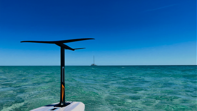 Load image into Gallery viewer, Green Hat Kiteboarding-CODE Foils S Series Complete Foil-Live Shot-Code Foil on an Upside Down Board on Crystal Blue Water