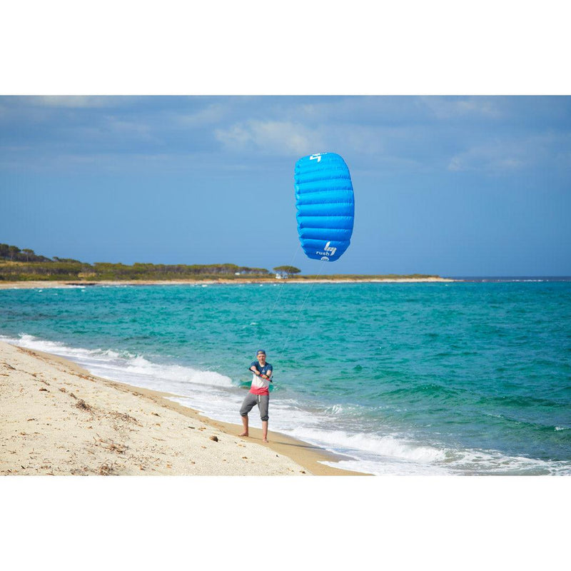 Load image into Gallery viewer, Green Hat Kiteboarding-HQ Rush Pro Trainer Kite-3m Blue-Man Flying Kite on the Beach