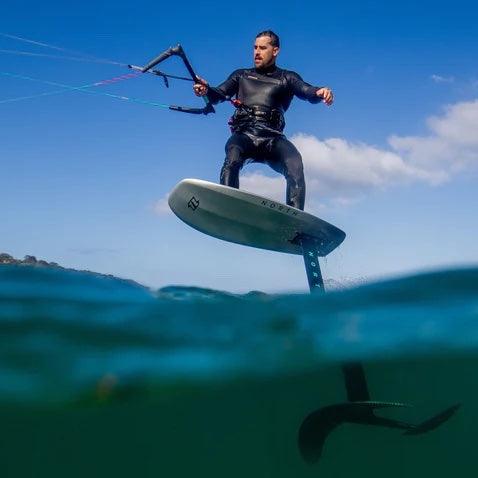 Load image into Gallery viewer, Green Hat Kiteboarding-North Sonar Front Wing-Action Shot-Man Kite Foiling on North Scoop