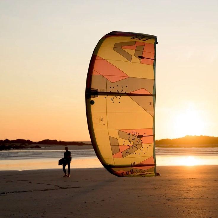 Load image into Gallery viewer, 2023 Duotone Evo SLS All-Around Kiteboarding Kite-Back lit by sun
