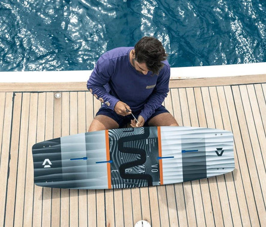 2023 Duotone Voyage Splitboard-Assembly on a dock-Pin insertion